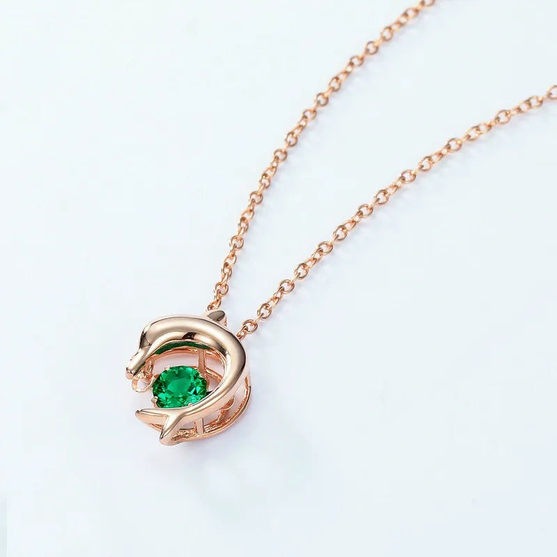 Round Cut Emerald Playful Dolphin Charm Nature Inspired Necklace