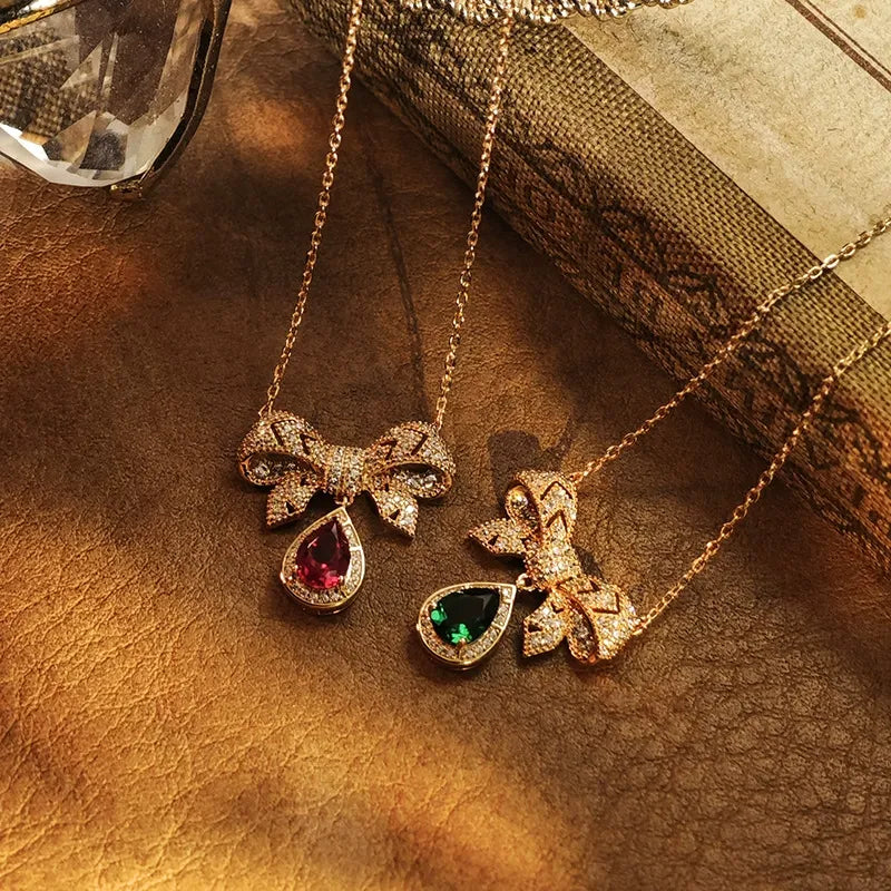 Pear Cut Lab Ruby Elegant Bow Design Necklace