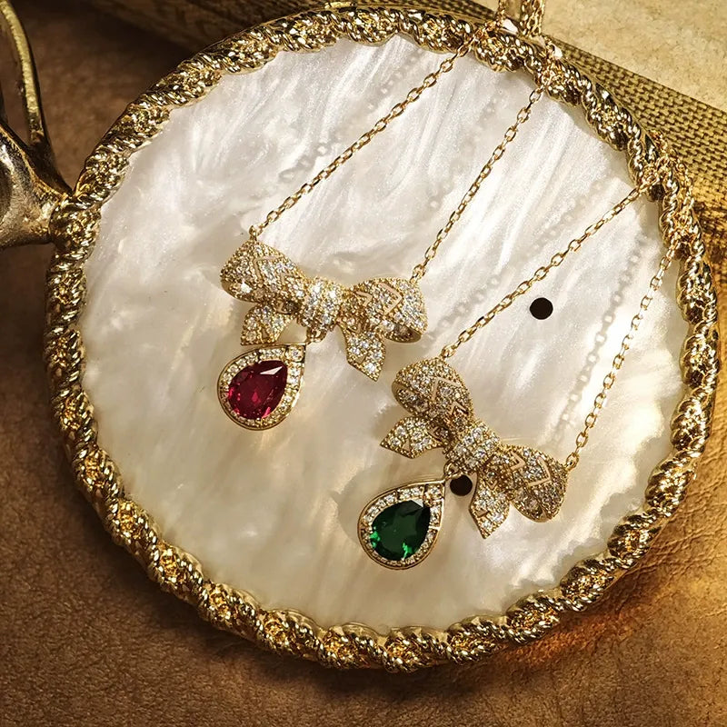 Pear Cut Lab Ruby Elegant Bow Design Necklace