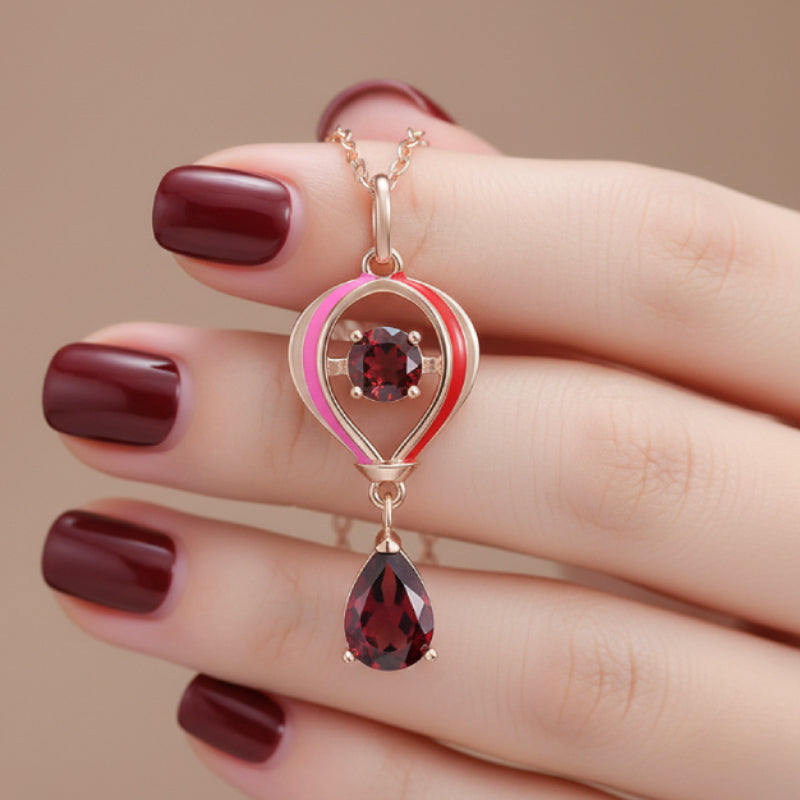 “Thea” Heart Shaped Pear Cut Garnet Unique Pendant