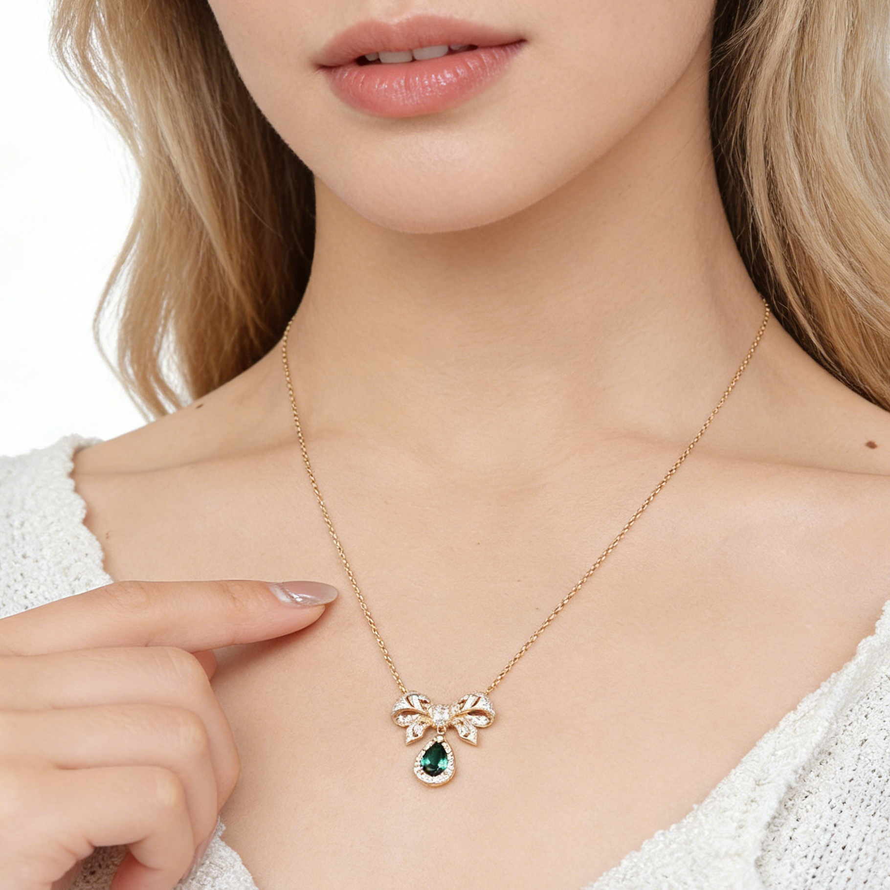 Collier élégant en rubis de laboratoire taille poire avec nœud papillon