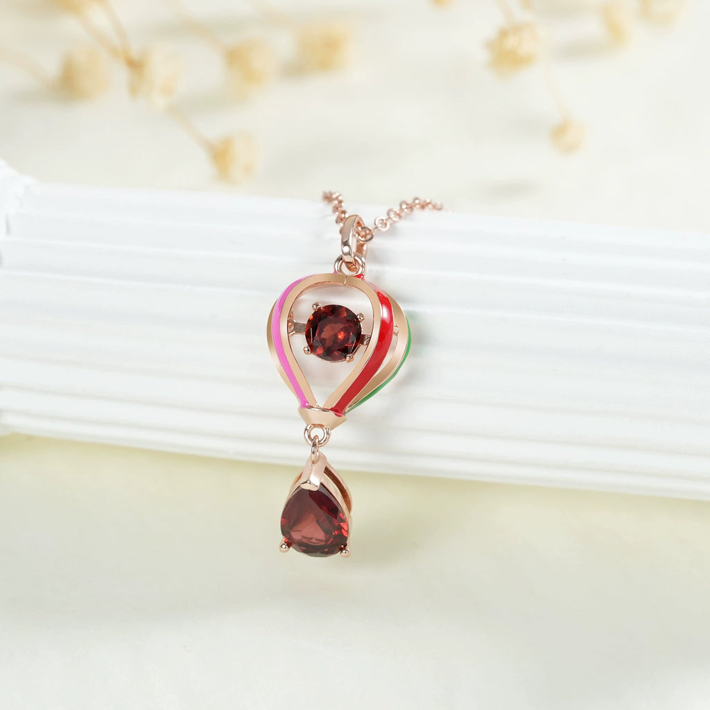 “Thea” Heart Shaped Pear Cut Garnet Unique Pendant