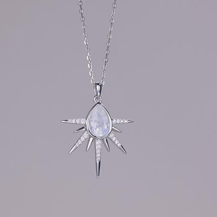 Collier pendentif galaxie en pierre de lune colorée taillée en poire